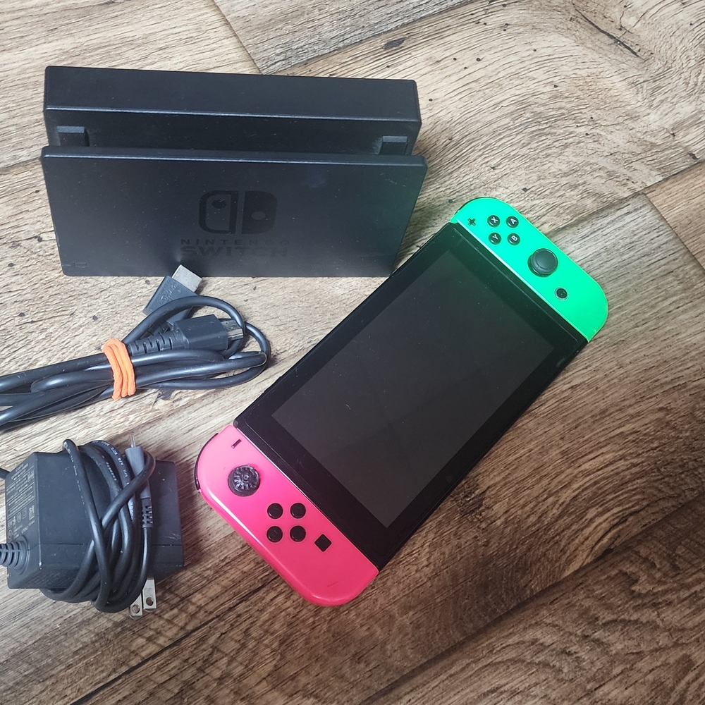 Nintendo Switch with Neon Pink and Green Joy-Con